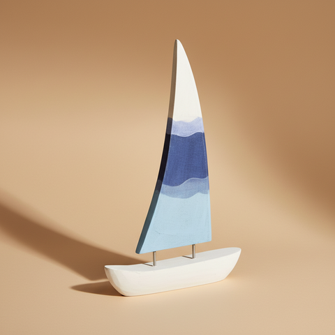 Barca a vela Tchaou sfumata azzurro sfondo beige