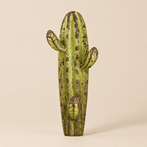 Cactus su sfondo beige tenue con ombra