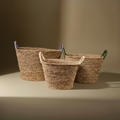 Ceste seagrass manici colorati sfondo taupe