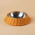 Ciotola pet polirattan arancione sfondo neutro