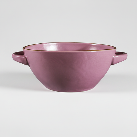 Ciotola rosa su sfondo grigio