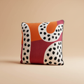 Cuscino astratto pois arancione magenta su sfondo beige