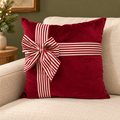 Cuscino Giftpack rosso su divano – ambientazione digitale