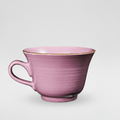 Tazza lilla su sfondo grigio