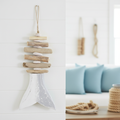 Campanello driftwood appeso in appartamento marino