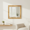 Specchio Les Bains Douches in legno mango appeso a parete in ambiente moderno