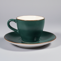 Tazzina verde ceramica su sfondo grigio
