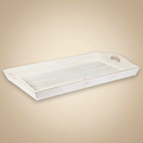 Vassoio rettangolare in legno bianco anticato su sfondo beige
