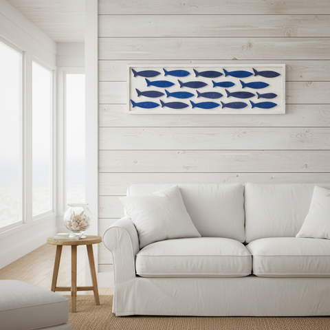 Quadro pesci blu coastal appeso in living beach house