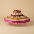 Paralume seagrass rosa arancio sfondo beige con ombra