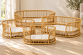 Set Rush Weaves quattro cucce rattan con cuscini ambientate in soggiorno