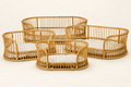 Set Rush Weaves quattro cucce rattan con cuscini su fondo avorio