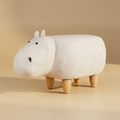 Pouf ippopotamo bianco/off-white - sfondo beige sabbia, luce dorata laterale