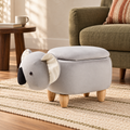 Pouf Koala rivolto a sinistra in un angolo lettura con poltrona verde oliva