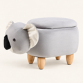 Pouf Koala con contenitore rivolto a sinistra su fondo avorio