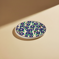 Sottopentola crema fiori blu navy - posizione sfondo beige