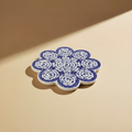 Sottopentola fiore spirali blu navy - sfondo beige