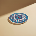 Sottopentola rotondo Iznik bianco/turchese/rosso - sfondo beige