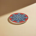 Sottopentola rotondo rosso/turchese medaglione arabeschi - sfondo beige