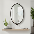 Specchio ovale in metallo nero in ambiente - nuova versione