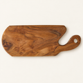 SUAR - TAGLIERE FORMA SINUOSA TEAK - su fondo avorio con ombre morbide