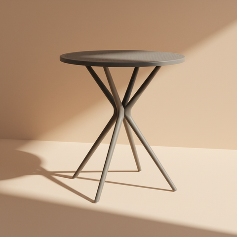 Tavolino rotondo grigio su sfondo neutro