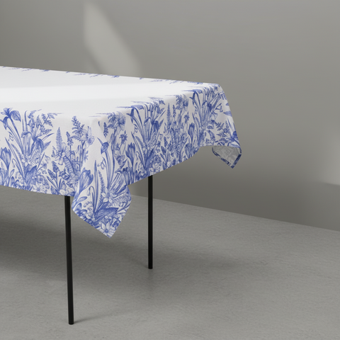 Tovaglia bianca con bordo floreale blu vista angolare