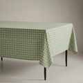 Tovaglia verde salvia a quadretti su sfondo neutro